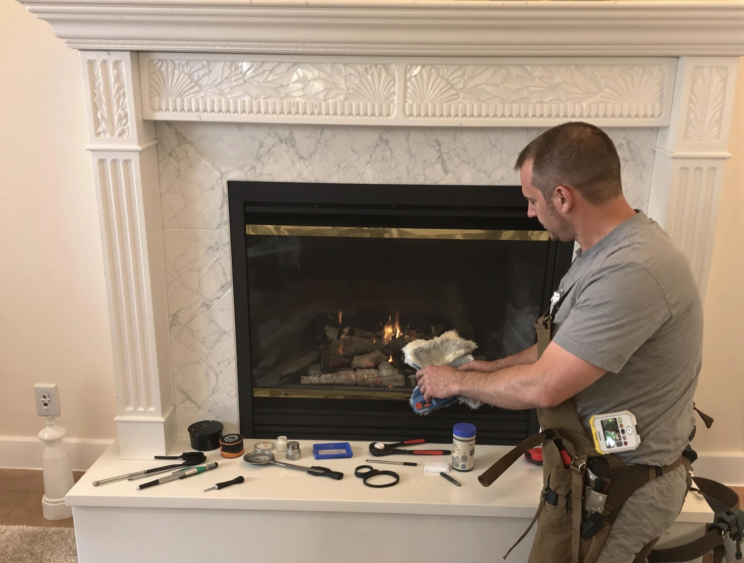 Everett Chimney Sweep performing fireplace maintenance in Everett, MA